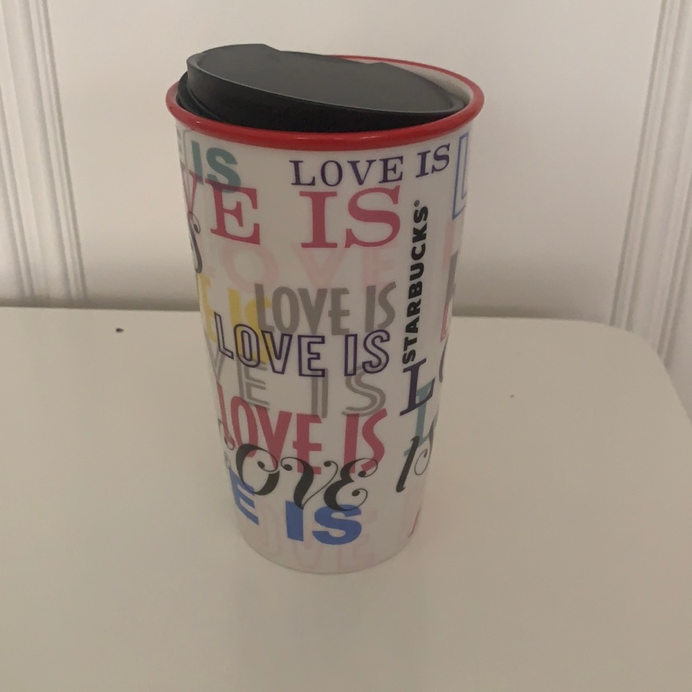 Never been used tall Starbucks coffe travel mug.